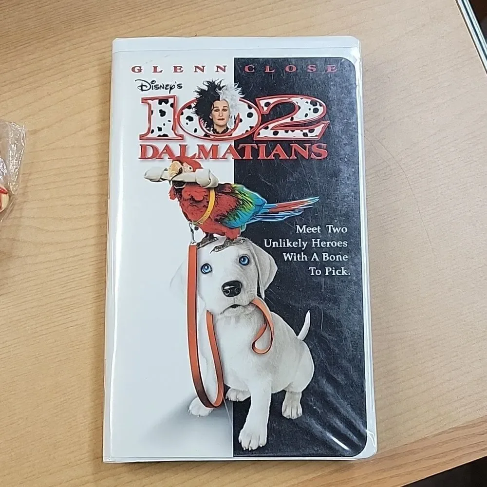 101‎ Dalmations bundle 2vhs movies, dog figure, Cruella De Vil figure